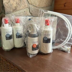 4 Insinkerator Filters & Filter Housing W/Fittings